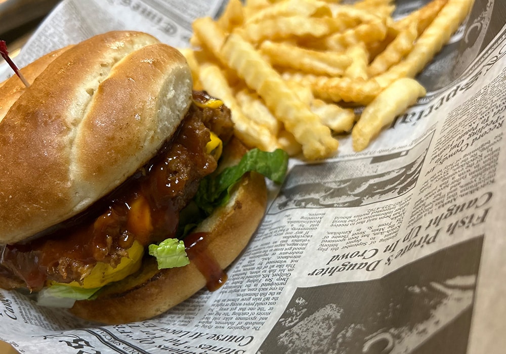 Burger With Fries On Newspaper